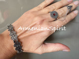 Elevate your style with our high-quality sterling silver jewelry from Armenian Spirit. This filigree lace bracelet and double ring feature a stunning red stone, perfect for fingers of sizes 6-9. Upgrade your look with our online store and enjoy exclusive discounts.