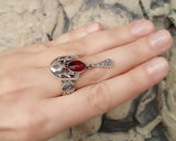 Elevate your style with our 925 silver pomegranate ring from Armenia. Made with high-quality materials, this beautiful piece of jewelry will add a touch of elegance to your look while also representing prosperity and abundance. Shop online now for a timeless addition to your collection.