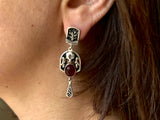 Enhance your jewelry collection with our high-quality 925 silver earrings. Handcrafted in Armenia, each pair features a stunning red oval stone garnet. Elevate any outfit with this timeless and elegant accessory. Shop now and add a touch of sophistication to your style.