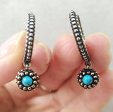 Imagine the allure of turquoise hoop earrings, their bright, sky-blue hues contrasting beautifully against the dark, textured surface of oxidized silver. These aren’t just earrings; they're a whisper of Armenian tradition, a piece of art that reflects a rich cultural tapestry. This distinctive aesthetic, often featuring delicate rings and complete jewelry sets, points to a recognizable Armenian style that transcends fleeting trends.