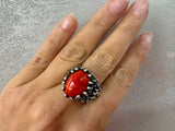 This artisan jewelry set features a large ring and earrings, crafted with high quality sterling silver 925. The bright orange almost red agate natural gem is truly one of a kind, making this the perfect gift for vintage lovers. Add a touch of uniqueness to your jewelry collection.