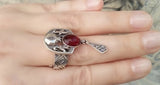 Discover the perfect pomegranate ring from Armenia. Made with high quality 925 silver, it's not only a stunning piece of jewelry but also a symbol of fertility and prosperity. Add a touch of elegance to any outfit with this unique and meaningful accessory. Buy online now.  Made from high quality 925 silver, this piece of jewelry is not only a stunning accessory, but also a representation of Armenian old culture. Experience the elegance and artistry of Armenia with this beautiful pomagarante ring.
