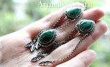 Upgrade your jewelry game with our exquisite green malachite silver and gold ring and earrings set. The teardrop gemstones are accented with delicate leaf details, making each piece unique and elegant. Elevate any outfit with these timeless accessories.Discover the perfect addition to your jewelry collection at our Best jewelry store.