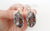 This exceptional set, comprised of earrings, a ring, and a pendant, immediately captivates with its rich color palette and intricate design. The focal point of each piece is the mesmerizing crazy lace agate, displaying deep, burgundy wine-red hues interwoven with captivating shades of gray. This isn't your run-of-the-mill gemstone; crazy lace agate is renowned for its unique, swirling patterns and natural variations, meaning no two stones are ever exactly alike. The swirling patterns create a sense of movem