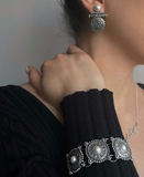 Inspired by traditional Western Armenian jewelry, this bracelet is handcrafted with high-quality sterling silver and accented with stunning pearls. With its chunky and detailed design, this piece truly makes a statement. Elevate your style with this unique and authentic Armenian handmade jewelry.
