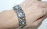 This high-quality sterling silver bracelet is a stunning piece of traditional Armenian jewelry. Handmade with care, it features exquisite pearls and intricate details, perfect for adding a touch of elegance to any outfit. Inspired by Western Armenian jewelry, it is a beautiful representation of Armenian culture and craftsmanship.