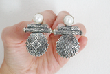 Indulge in the beauty of traditional Armenian jewelry with our high quality sterling silver 925 earrings. Adorned with pearls and large geometric details, these chunky earrings are perfect for adding a touch of boho style to your dresses or a touch of sophistication to your formal jackets. Handmade with love, these earrings are inspired by Western Armenian jewelry and are sure to make a statement.