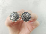 Buy armenian earrings from armenian jewelry store online is not a problem. This store is also available at etsy and ebay. These earrings are round in a flower shape and the earrings looks nice on the earlobe, very close.