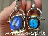Upgrade your jewelry collection with the finest quality sterling silver 925 earrings from Armenian Spirit. The stunning Labradorite natural gem adds a touch of elegance to any outfit - perfect for a blue dress matching on your next vacation. With free worldwide shipping and discounts available, bring some love into your life with these birthstone dangle earrings.
