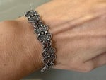Indulge in luxury with our exquisite high-quality jewelry. Crafted with sterling silver 925, perfect for sensitive skin. Our traditional delicate bracelet boasts a western Armenian design, exuding sophistication and opulence. Elevate your style and manifest your wealth with this exclusive piece.

