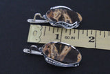 Discover the unique beauty of Sterling Silver 925 handmade Armenian jewelry. This one-of-a-kind piece features a striking combination of coconut jasper in caramel yellow and brown, paired with a sterling silver oval design. With its vintage-inspired minimalistic style, this high quality jewelry is truly a standout piece.
