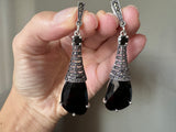 Upgrade your jewelry collection with our stunning Sterling Silver 925 drop earrings. The elegant black faceted stone is perfect for any occasion, whether it's a rooftop party or a formal event. Handcrafted in Armenia, these eye-catching earrings are both classic and unique. Enjoy free worldwide shipping and exclusive discounts now.
