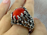 As a sterling silver 925 stamped Artisan jewelry, our high quality jewelry boasts a large, one-of-a-kind bright orange almost red agate natural gem. With this unique piece, you'll make a statement that's both bold and elegant. Buy rough oxidized  silver ring with cabochon orange gem.

