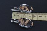 This handmade Armenian jewelry features a unique combination of coconut jasper stones in caramel yellow and brown, expertly crafted with high-quality sterling silver. Each piece is one-of-a-kind, making it a truly special addition to your collection. Elevate any ensemble with this stunning and unique one of a kind accessory.
