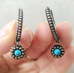 Imagine the allure of turquoise hoop earrings, their bright, sky-blue hues contrasting beautifully against the dark, textured surface of oxidized silver. These aren’t just earrings; they're a whisper of Armenian tradition, a piece of art that reflects a rich cultural tapestry. This distinctive aesthetic, often featuring delicate rings and complete jewelry sets, points to a recognizable Armenian style that transcends fleeting trends.


