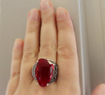 Add a touch of vintage elegance to your look with our sterling silver 925 ring. Featuring a faceted red faceted stone, this classic piece is perfect for special occasions, from open cafe parties to formal events. With free shipping worldwide and discounts available, it's the ideal choice to complement your red dress and neckline. Embrace Armenian jewelry with this eye-catching and shiny addition to your collection. Buy jewelry from luxury store for Marbella and Ibiza parties.
