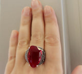 Add a touch of vintage elegance to your look with our sterling silver 925 ring. Featuring a faceted red faceted stone, this classic piece is perfect for special occasions, from open cafe parties to formal events. With free shipping worldwide and discounts available, it's the ideal choice to complement your red dress and neckline. Embrace Armenian jewelry with this eye-catching and shiny addition to your collection. Buy jewelry from luxury store for Marbella and Ibiza parties.
