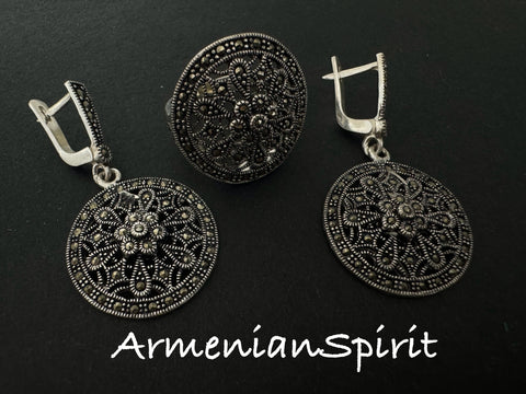 Enhance your luxury style with our high-quality, Armenian silver jewelry. Our classic, round earrings feature shimmering marcasite stones for a sparkling touch. Perfect for any occasion, from casual outings to formal parties, these earrings make a stunning gift for any mother. Elevate your fashion with our luxurious, beach-style jewelry.
