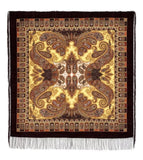 Close-up of a premium merino wool palantine featuring a black, orange, and brown pattern with fringes. Close-up shot of a high-quality merino wool shawl, highlighting the soft texture of the wool and the contrasting geometric motifs in black, burnt orange, and warm brown.