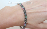 Multicolored marcasite bracelet on a wrist with 'Armenian Spirit' text.