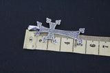 Armenian sterling silver cross made with traditional patterns and eight points for sale with measurements 5 cm. 