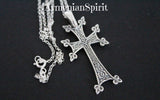 A large silver Armenian cross with intricate Armenian traditional designs, displayed alongside a sterling silver chain with Armenian Spirit jewelry brand title.