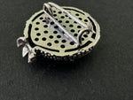 This beautiful, handmade Armenian jewelry features a pomegranate brooch made with high-quality sterling silver and a stunning red transparent stone. At 1 inch in size, it can be worn on dresses or hats, adding a touch of elegance and sophistication to any outfit. Perfect for those who appreciate fine, handmade jewelry.
