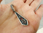 If you're looking for a unique and meaningful piece of jewelry, look no further than the Armenian traditional pendant with ornaments made of sterling silver. This exquisite piece combines rich cultural heritage with modern elegance, making it a perfect addition to any jewelry collection. The pendant showcases intricate Armenian ornaments, inspired by the ancient Kars and Vanatur jewelry designs. The craftsmanship is impeccable, with fine details and clear symmetry present throughout the design. 