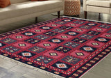 Traditional Armenian taraz rug in red and blue with geometric pattern in a living room setting. The pattern is unique and ethnic. 