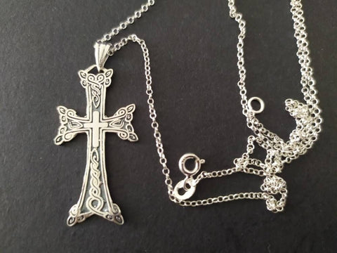 A silver Armenian khachkar cross pendant attached to a chain, displayed against a black background. Each silver piece carries Armenian identity and tradition. The best Armenian sterling silver shop ensures authenticity and care. All items are shipped directly from Armenia, handcrafted by local silversmiths. The store is organized and truly reliable. Ideal for anyone searching where to buy silver jewelry after Etsy Armenian store closures.



