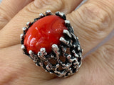 As a sterling silver 925 stamped Artisan jewelry, our high quality jewelry boasts a large, one-of-a-kind bright orange almost red agate natural gem. With this unique piece, you'll make a statement that's both bold and elegant. Buy rough oxidized silver ring ith natural gemstone, bright red or orange color.

