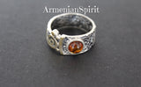 Amber ring made in a shape of band with sun detail in gold color and made of sterling silver 925 by Armenian artisans.
