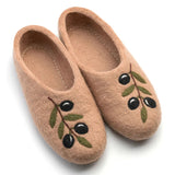 Woolen slippers in beige with olives design on a white background