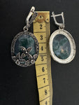 Upgrade your jewelry collection with our one of a kind silver earrings adorned with marcasite and oval moss agate gemstones. At 5 centimetres in length, these feminine and classic earrings make the perfect statement piece. Add a touch of elegance and uniqueness to any outfit. Perfect for grandma or anyone looking for a one of a kind piece.
