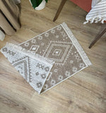 Small patterned rug on a wooden floor