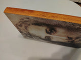 This religious artwork depicts Jesus Christ on a thick natural wooden panel. The piece is handmade and intentionally left unframed to preserve its natural, rustic appearance. A meaningful addition to a Christian home, prayer corner, or collection of religious art.