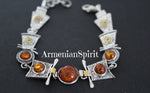 This modern bracelet features a high-quality silver design stamped with 925, showcasing the exquisite beauty of colorful natural gemstones. The amber orange gemstone with a honey hue adds a touch of geometric elegance to any outfit. Elevate your style with this stunning and unique piece.
