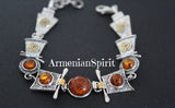 This modern bracelet features a high-quality silver design stamped with 925, showcasing the exquisite beauty of colorful natural gemstones. The amber orange gemstone with a honey hue adds a touch of geometric elegance to any outfit. Elevate your style with this stunning and unique piece.
