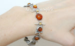 Add some color to your style with our high quality sterling silver 925 bracelet featuring a colorful array of natural gemstones. Perfect as a gift for vintage-loving mothers-in-law or anyone who loves unique accessories. Order now from our reliable online store!
