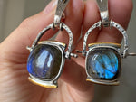 Discover the beauty of Armenian craftsmanship with our sterling silver 925 Labradorite dangle earrings. Perfect for any occasion, these natural gemstones bring not only stunning style but also love and positive energy. Take advantage of our free worldwide shipping and discounts for a seamless online purchase.
