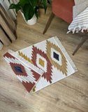 Decorative Armenian rug beige and red with geometric pattern on a wooden floor