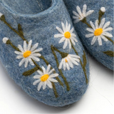 Light blue merino wool slippers with chamomile mebroidery.