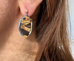 Indulge in the unique, one-of-a-kind beauty of our handmade Armenian jewelry. This vintage-inspired, minimalist style piece features striped coconut jasper in a mouth-watering caramel yellow and brown shade, complemented by a sterling silver oval. With high quality craftsmanship, it's a true gem for any jewelry collection.
