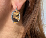 Indulge in the unique, one-of-a-kind beauty of our handmade Armenian jewelry. This vintage-inspired, minimalist style piece features striped coconut jasper in a mouth-watering caramel yellow and brown shade, complemented by a sterling silver oval. With high quality craftsmanship, it's a true gem for any jewelry collection.
