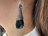 Crafted from high quality sterling silver 925, these long drop earrings feature a stunning black stone. Part of our classic and eye-catching Armenian jewelry collection, they are designed to make a statement. Enjoy free shipping worldwide and exclusive discounts on this unique and elegant piece.
