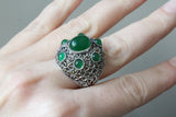 Large dome-shaped silver ring with green quartz stones, handcrafted with marcasite details, displayed against a black background with the text 'ArmenianSpirit'.