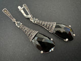 Discover the timeless beauty of these sterling silver 925, high quality earrings. Adorned with a striking black faceted stone, they are perfect for adding a touch of elegance and intrigue to any outfit. With free shipping worldwide and available discounts, these eye-catching Armenian jewelry pieces are a must-have for parties in roof cafes or as a best idea for a gift.
