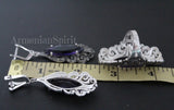 Long earrings and ring with marcasite and purple stones near a yellow ruler showing the large size with Armenian Spirit brand name.