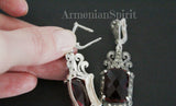 Oxidized silver long Tudor earrings with vibrant red stones and glittering marcasite accents from the Armenian Spirit collection.