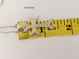 Armenian traditional eight pointed cross with eternity arevakhach in the center on a yellow ruler showing 1.5 inch.